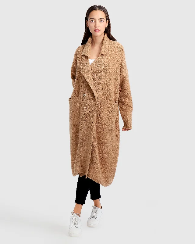Sustainable Women's Apparel The Latest Trends Born To Run Sustainable Sweater Coat